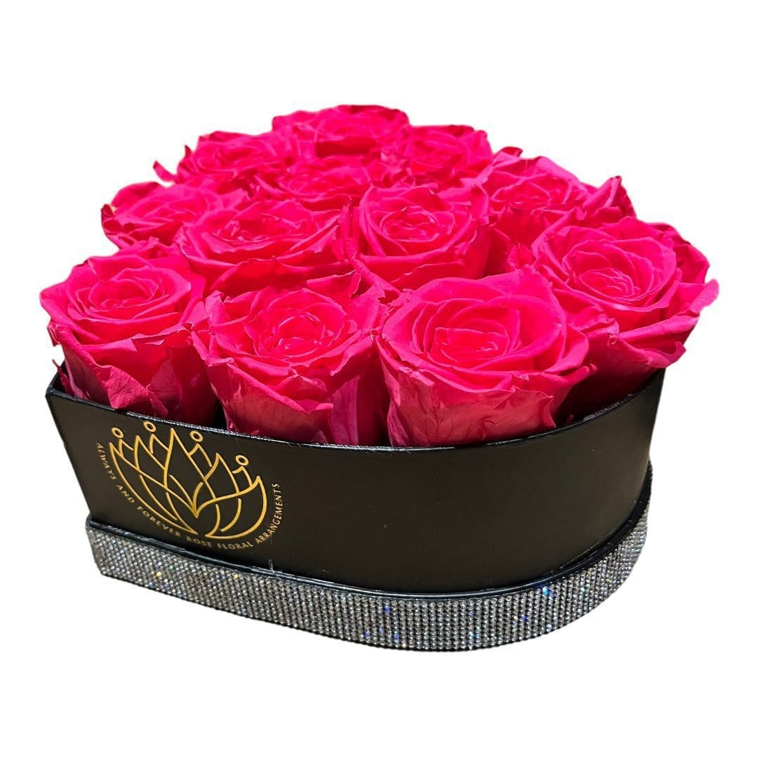 A box of roses in the shape of a heart.