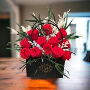 A wooden table with flowers in it