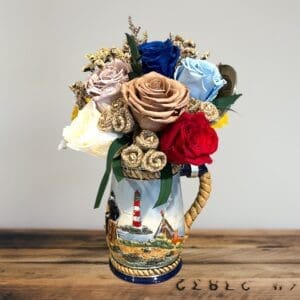 A vase with flowers in it on top of a table.